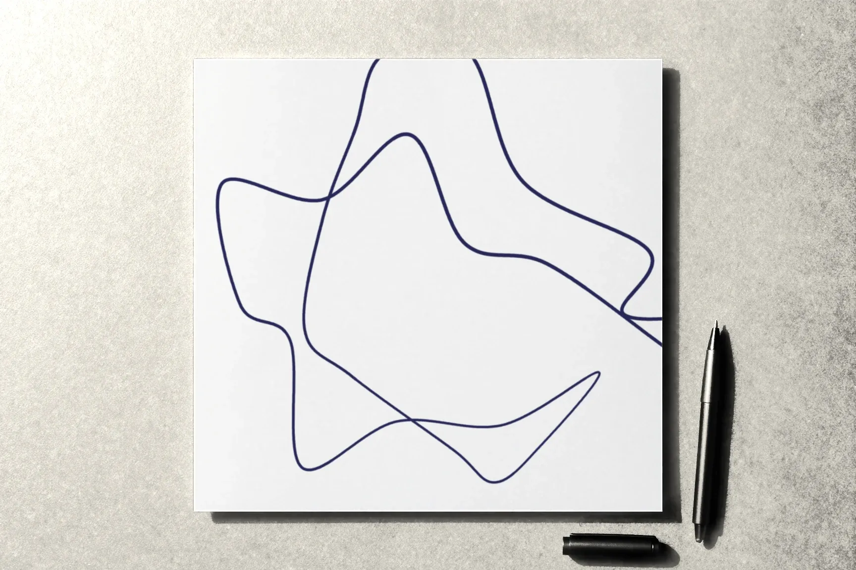 One free line across the whole sheet, an uncapped fine-liner beside it.