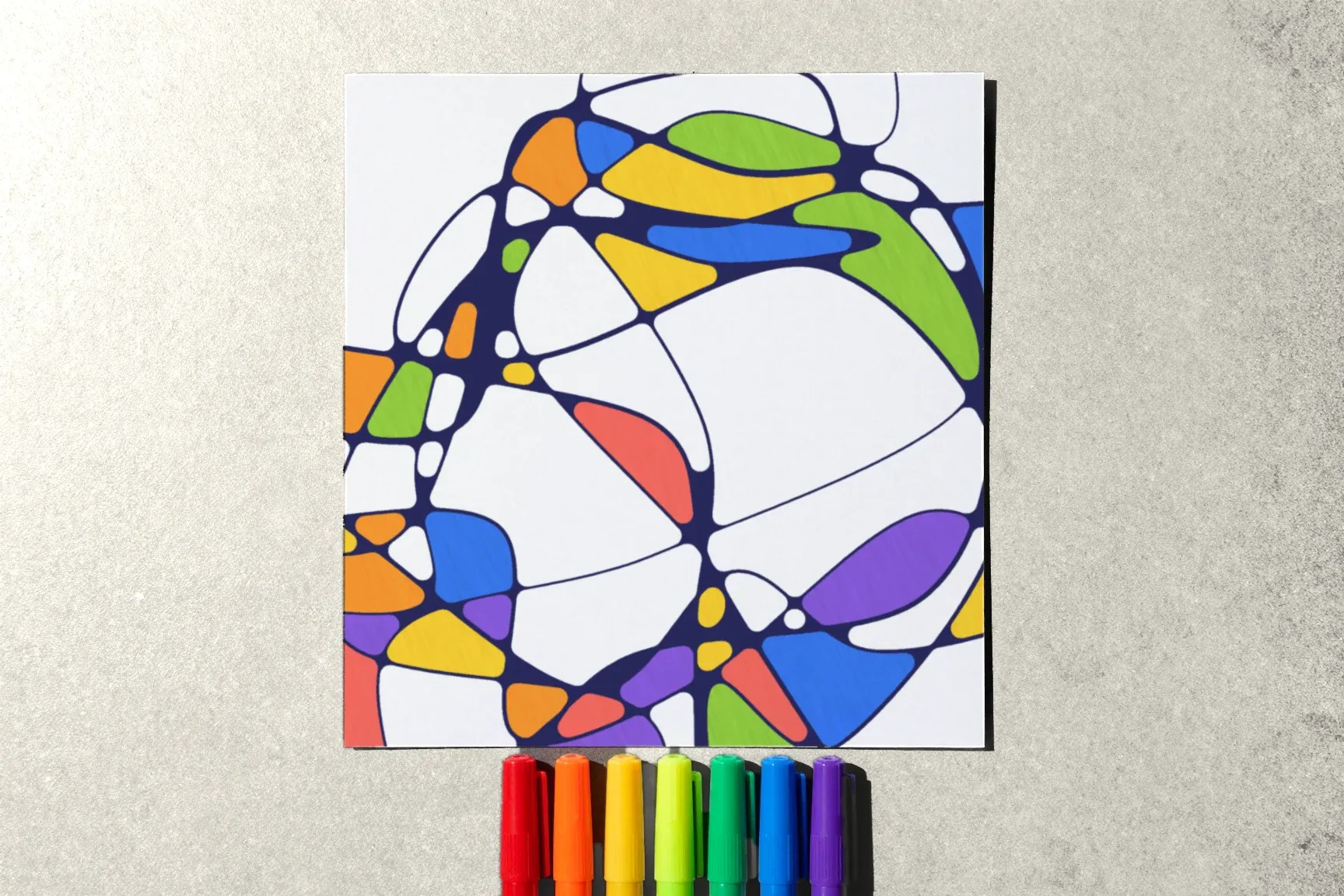 A drawing two thirds coloured, seven markers in seven colours in a row below it.