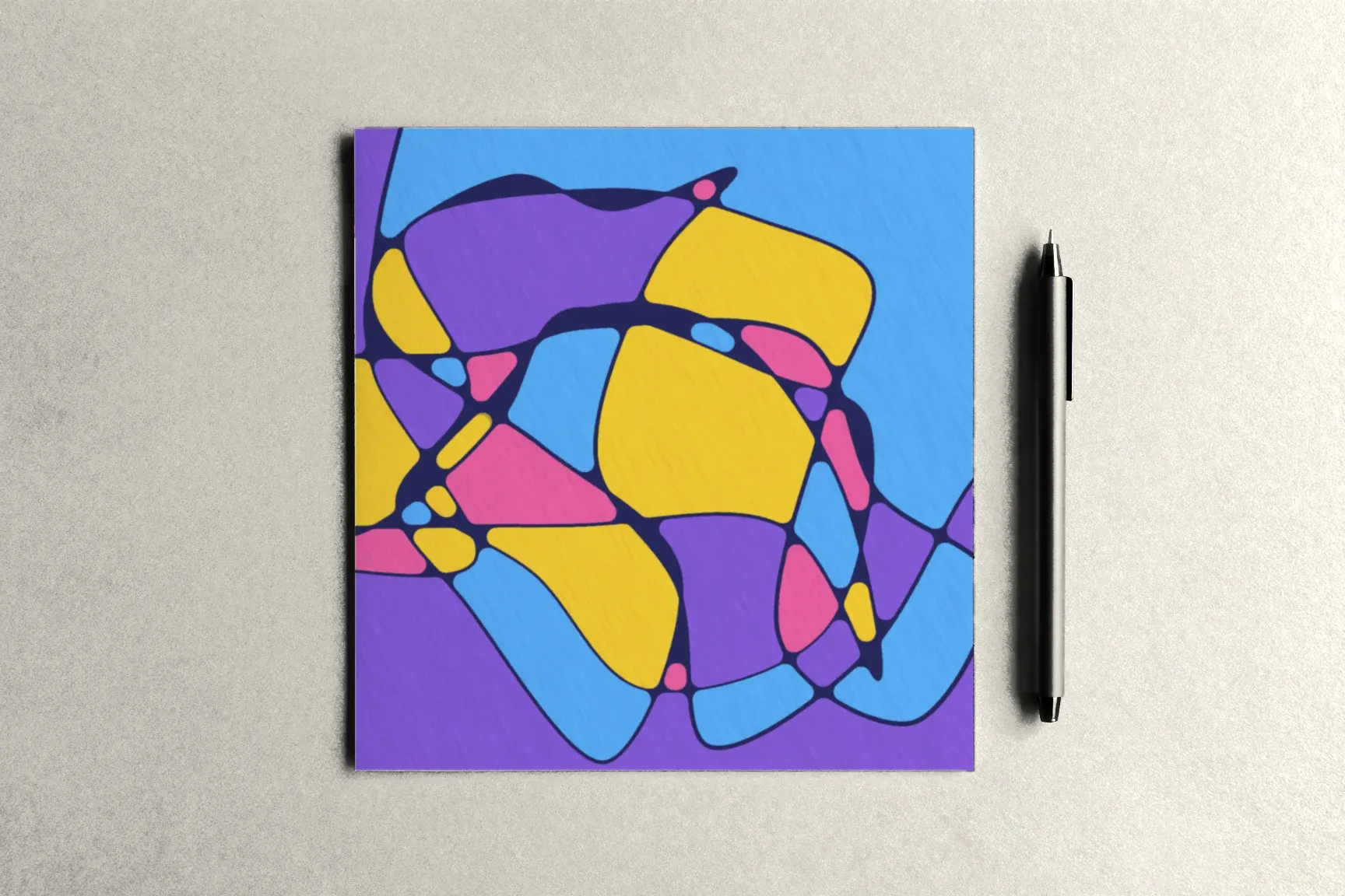 A small coloured drawing of three free lines and plenty of empty table around it.