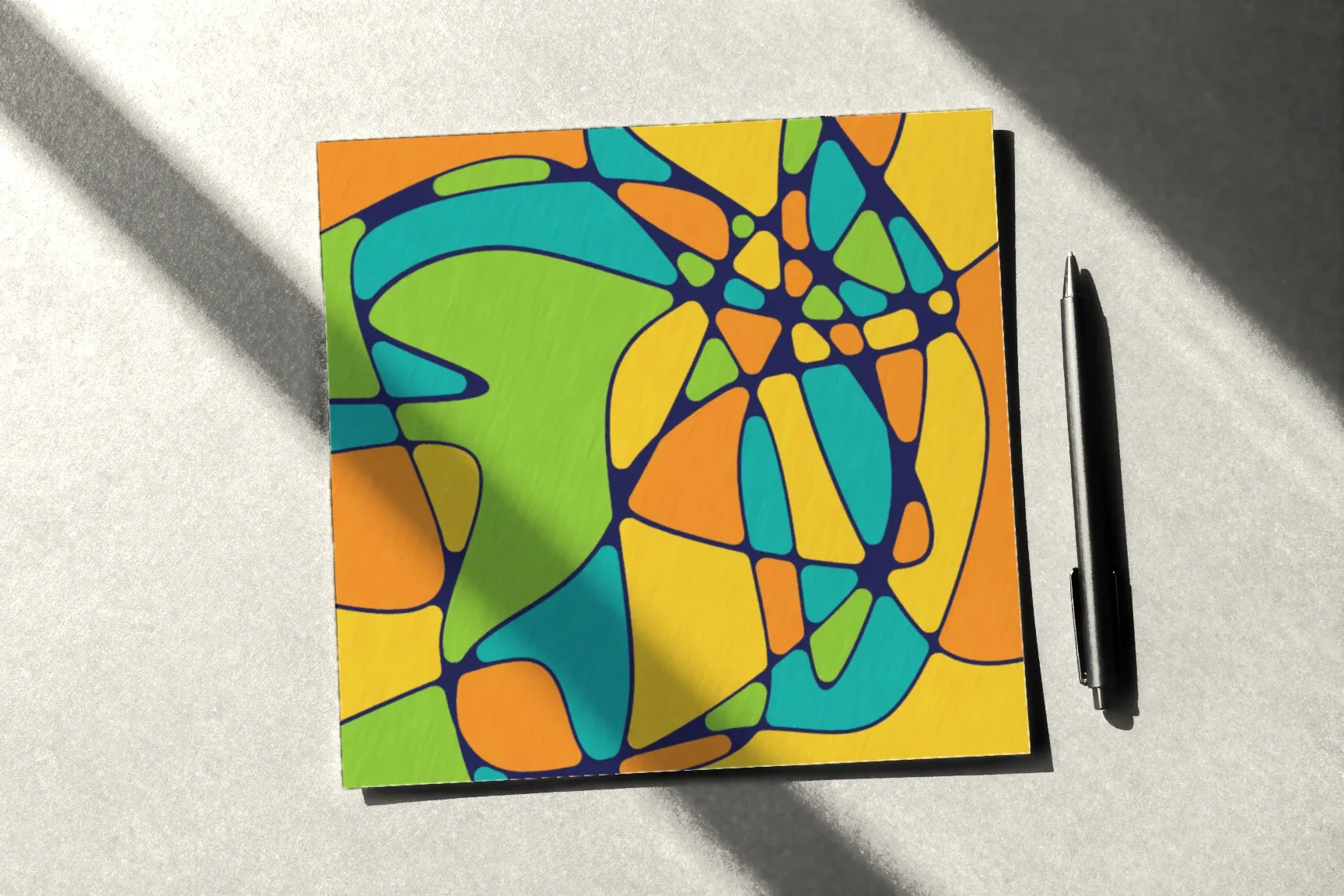A coloured drawing in morning light, window shadows on the table, a fine-liner beside it.